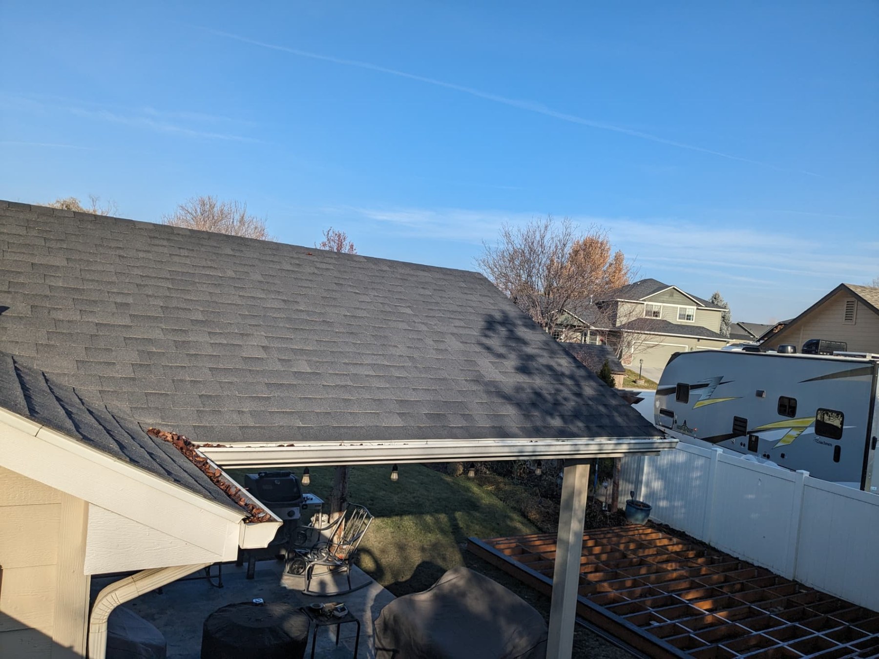 Residential roofline and gutter during a maintenance visit