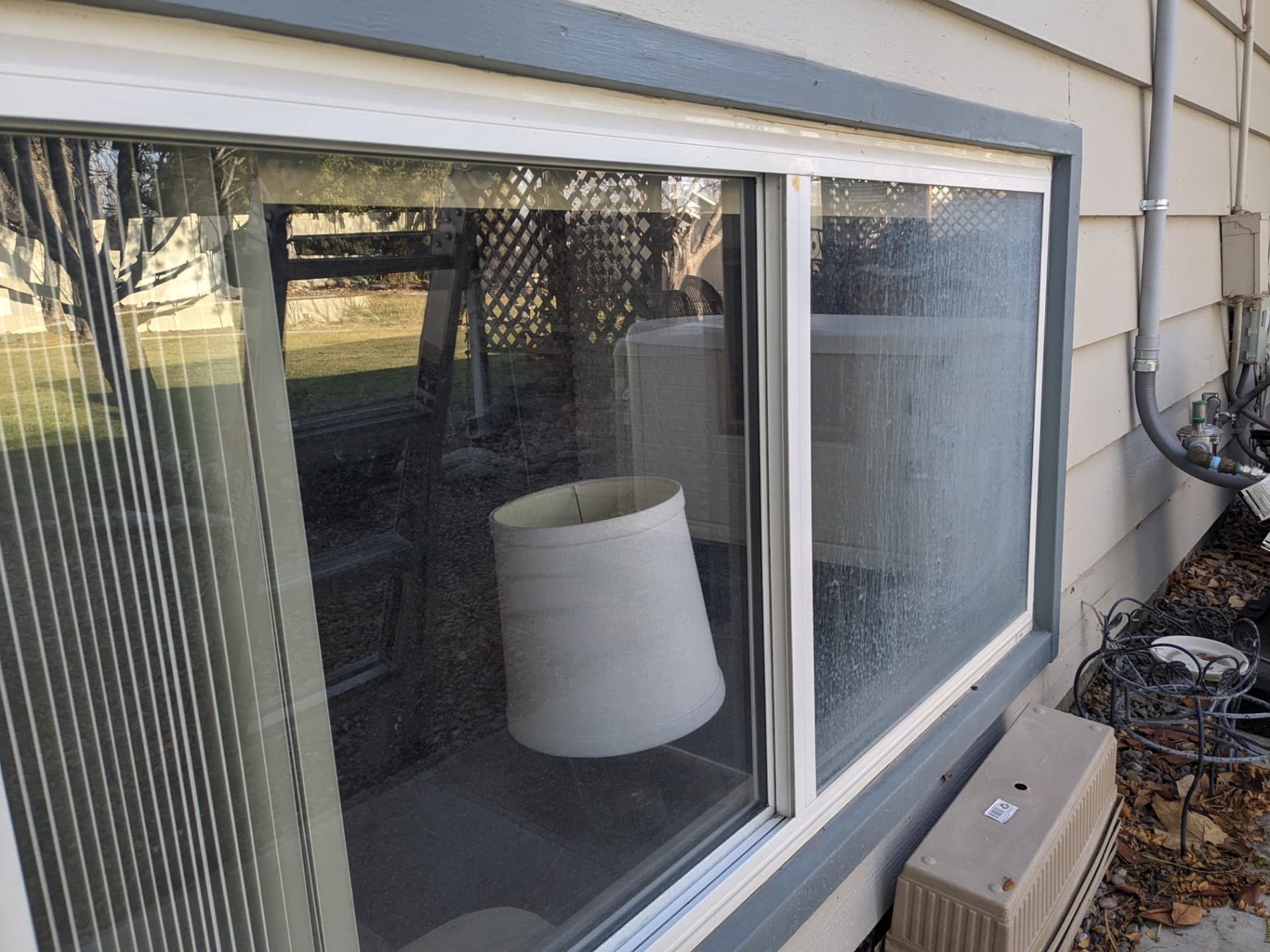 Residential window glass during a cleaning job
